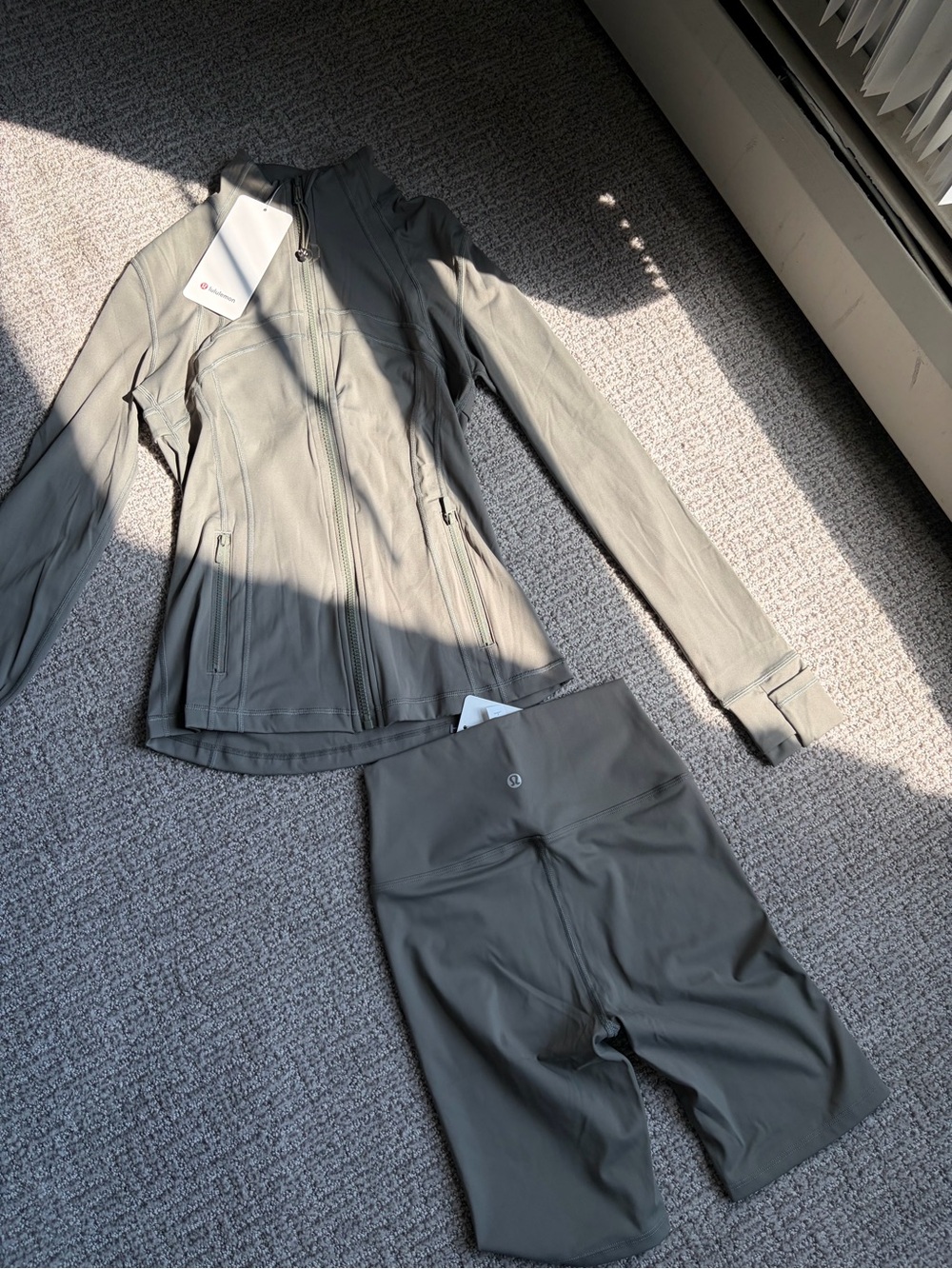 athletica Olive Green Jacket and High-Rise Bike Shorts